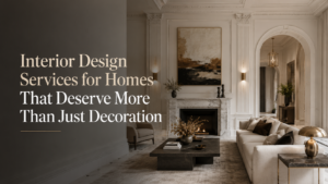Luxury neoclassical living room interior with elegant wall detailing, marble fireplace, soft neutral furniture, and headline text for interior design services.